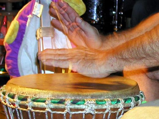 [IMAGE: drumming hands photo]